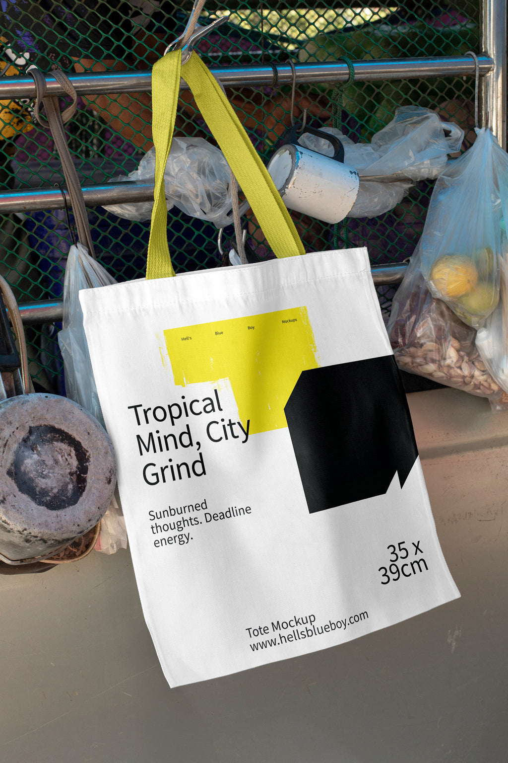 High-resolution tote bag mockup hanging from a pickup truck with food scene backdrop. Built for merch presentations, logos, and fabric print concepts.