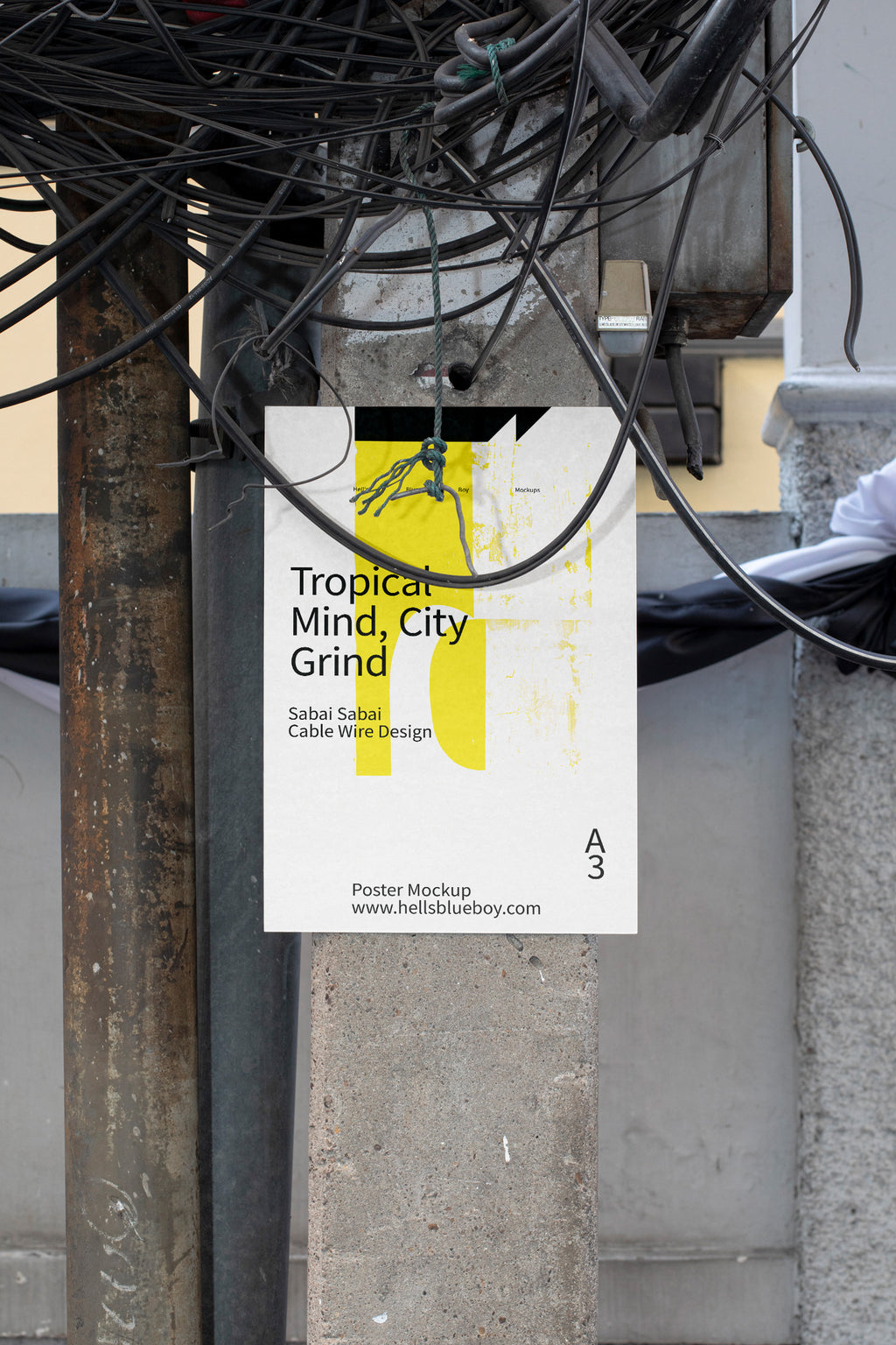 Poster mockup with cable wires hanging from top.