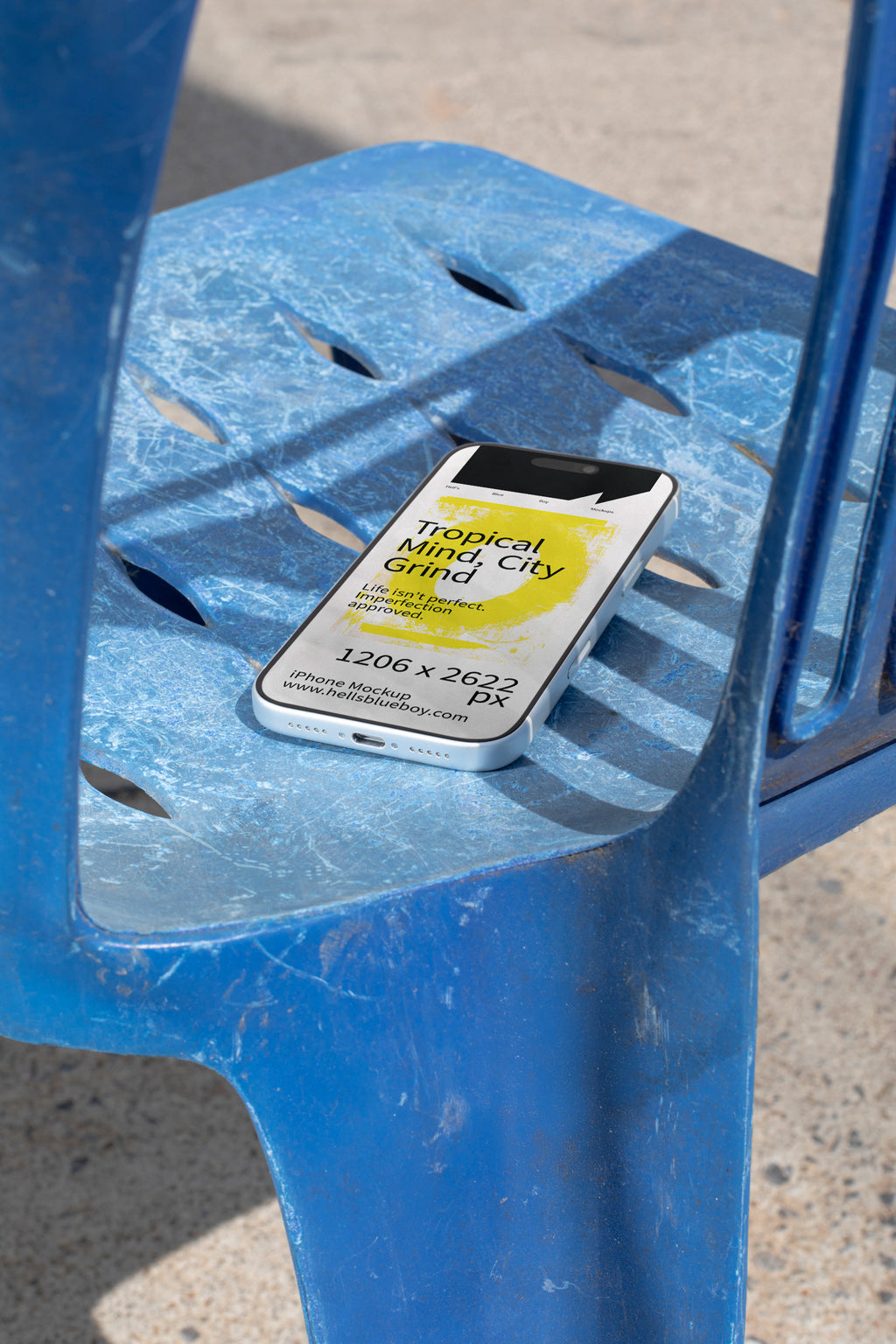 iPhone mockup lying on a blue plastic chair with strong shadows. Ideal for showcasing app screens, UI design, and mobile branding visuals.